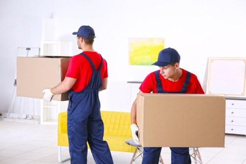 Professional movers preparing a Westminster home relocation in a central London street