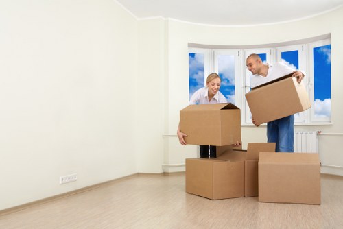 Boxes and furniture being loaded into a removal truck for a Westminster move