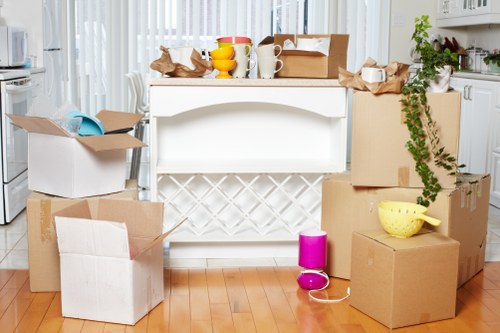 Staff using protective handling methods during a property move