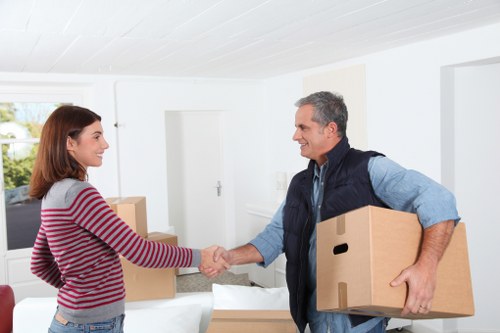 Professional movers handling belongings carefully during a Westminster relocation