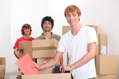 Local movers preparing boxes in central Westminster