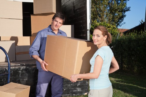 Packing supplies and furniture arranged for a Westminster moving service